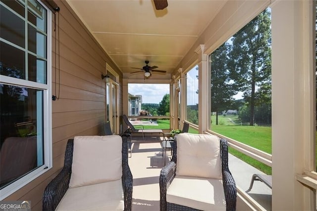 view of patio / terrace featuring ceiling fan