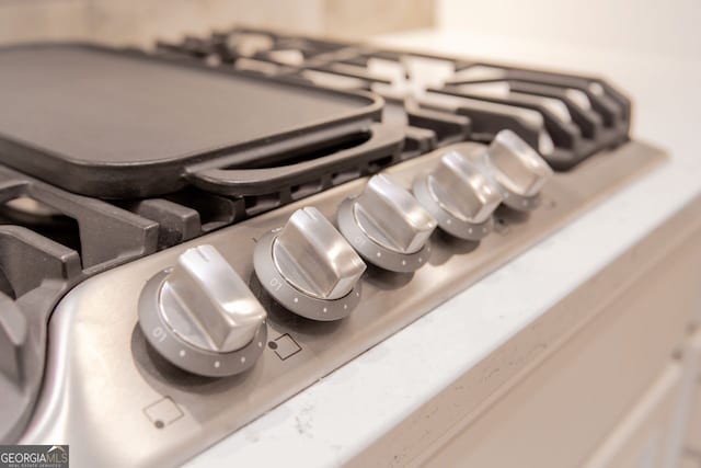 details featuring stainless steel gas stovetop