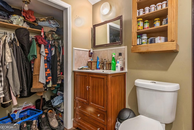 bathroom with vanity and toilet