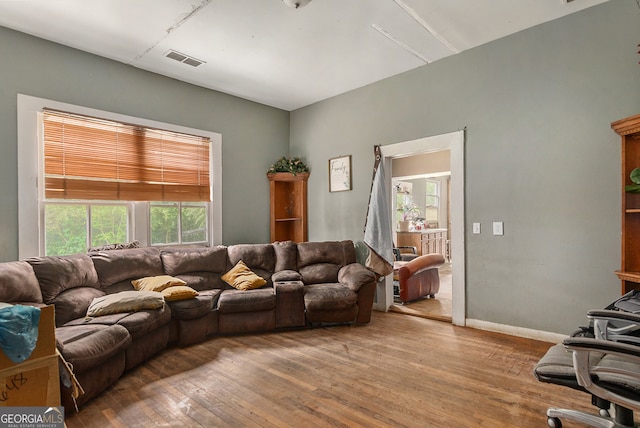 living room with hardwood / wood-style flooring