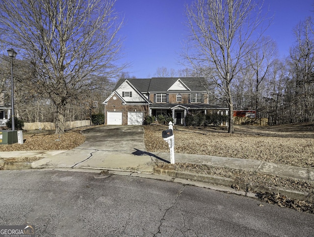 1301 Crosswind Pl, Mcdonough, GA 30252 - view of front of house with driveway and an attached garage