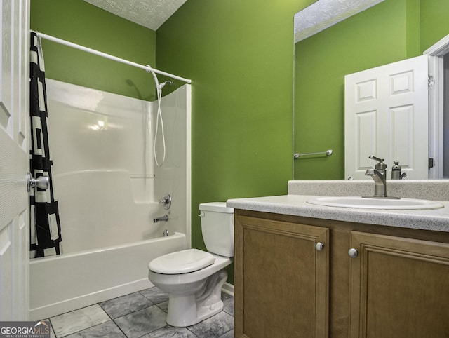 1301 Crosswind Pl, Mcdonough, GA 30252 - full bathroom featuring shower / bathtub combination, toilet, vanity, and a textured ceiling