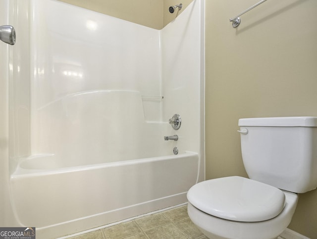 1301 Crosswind Pl, Mcdonough, GA 30252 - full bath with toilet, tile patterned flooring, shower / washtub combination, and baseboards