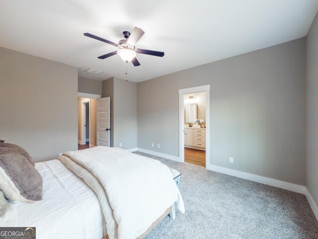 carpeted bedroom with ceiling fan