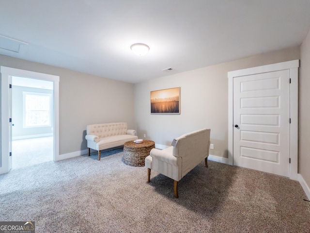 living area with carpet floors