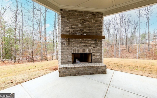100 Tuxedo Cir, Forsyth, GA 31029 - view of patio with an outdoor brick fireplace