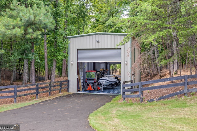 view of outbuilding with a garage