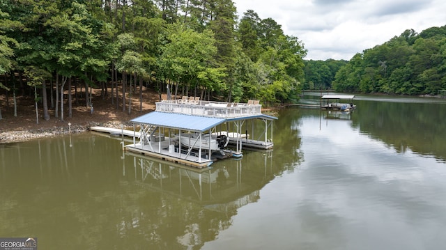 view of dock with a water view