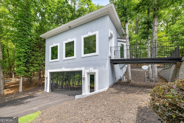 view of home's exterior featuring central AC