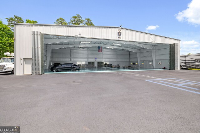 view of car parking featuring a carport