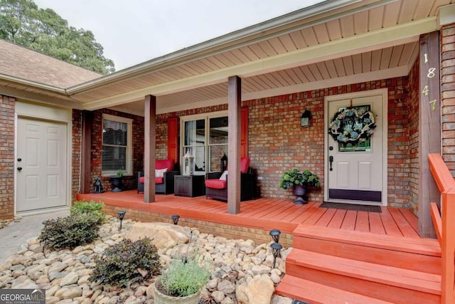 property entrance with a porch