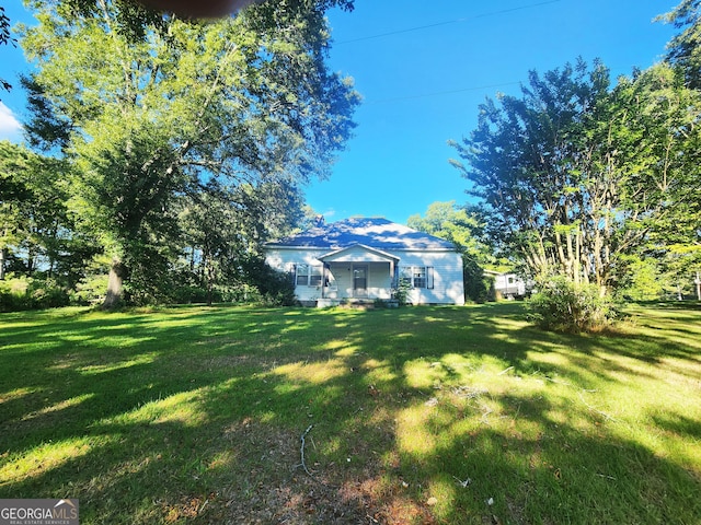 view of yard with a porch