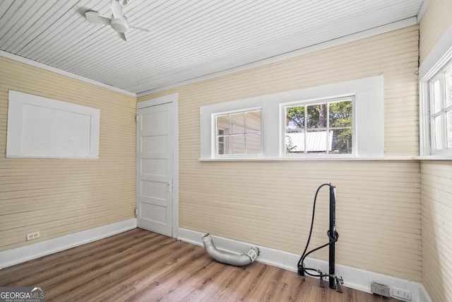 interior space with ceiling fan and hardwood / wood-style floors