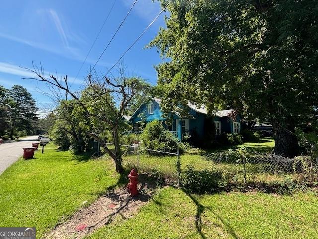 view of yard featuring fence