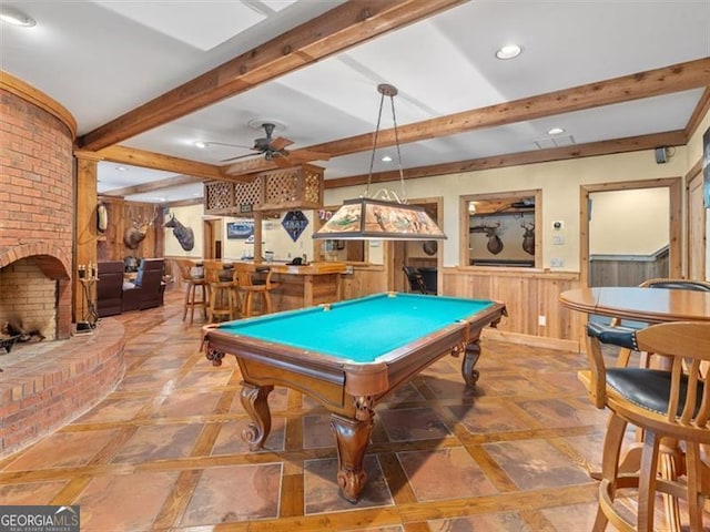 recreation room featuring ceiling fan, pool table, indoor bar, light tile patterned floors, and beamed ceiling