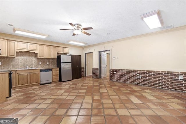 kitchen featuring light tile patterned floors, sink, white dishwasher, stainless steel refrigerator, and ceiling fan