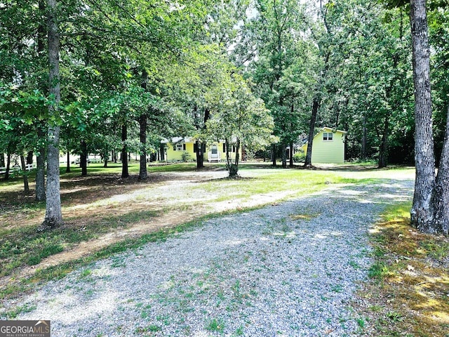 view of road featuring driveway