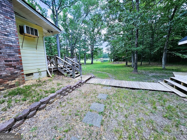 view of yard featuring a wooden deck