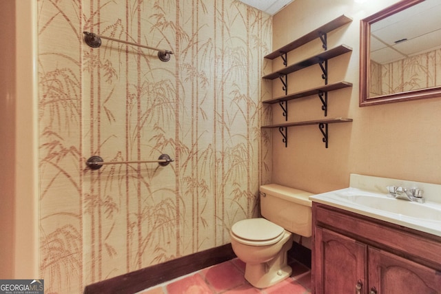 bathroom with vanity and toilet