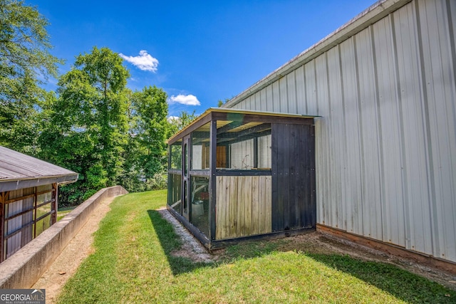 exterior space featuring an outdoor structure