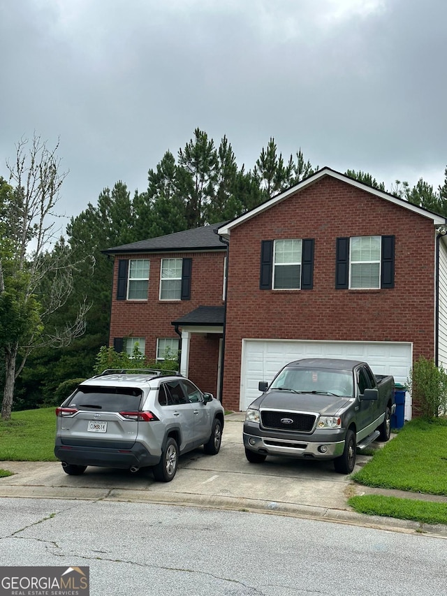 view of front of property featuring a garage