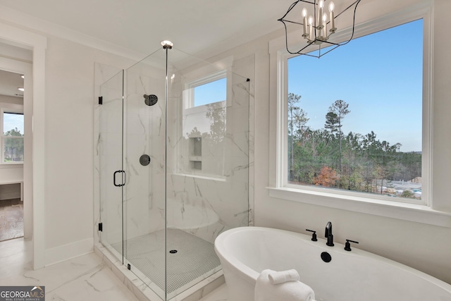 bathroom featuring crown molding, a healthy amount of sunlight, and shower with separate bathtub