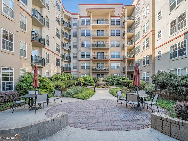 view of community with a patio