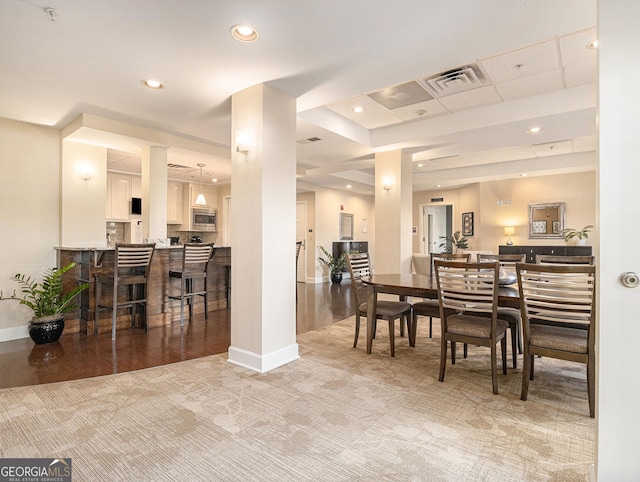 dining area with carpet, visible vents, baseboards, and recessed lighting