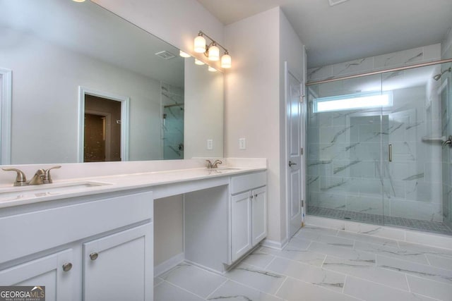 bathroom with an enclosed shower and vanity