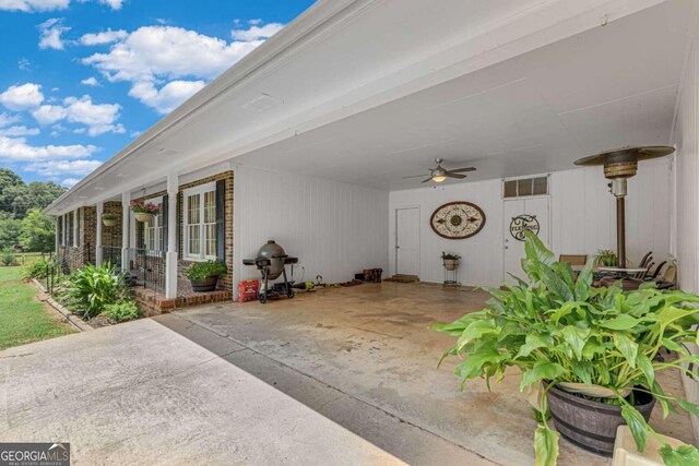 exterior space featuring a patio and ceiling fan