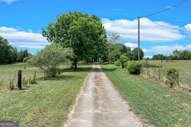 view of street featuring a rural view