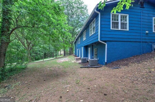 view of home's exterior featuring central AC unit