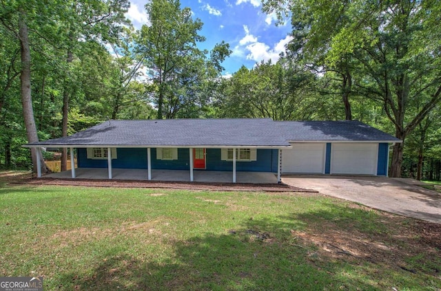 ranch-style home with a garage, a porch, and a front yard