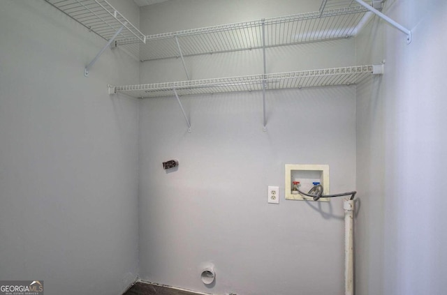 washroom with washer hookup and hookup for an electric dryer