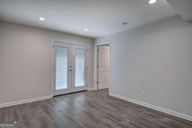 interior space with dark wood-type flooring and french doors