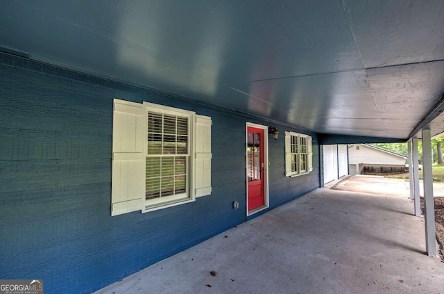 property entrance with a patio