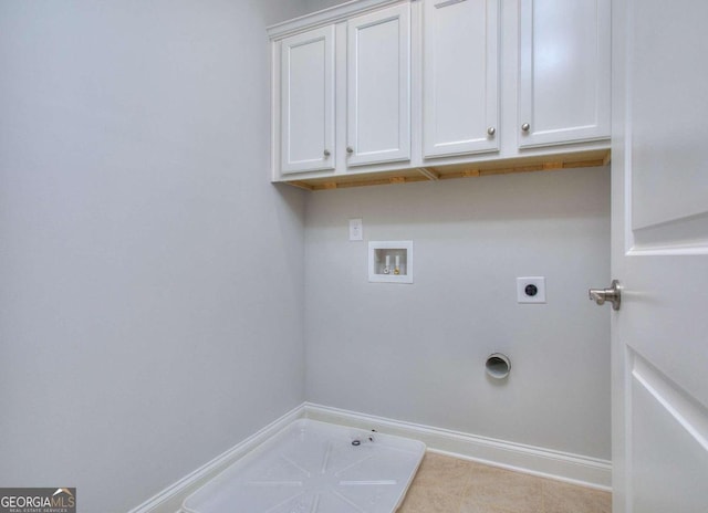 laundry area with cabinet space, washer hookup, electric dryer hookup, baseboards, and gas dryer hookup