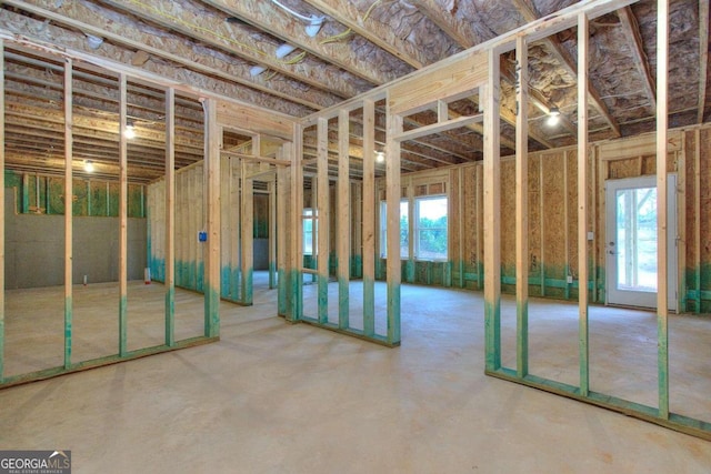 misc room featuring a wealth of natural light and concrete floors