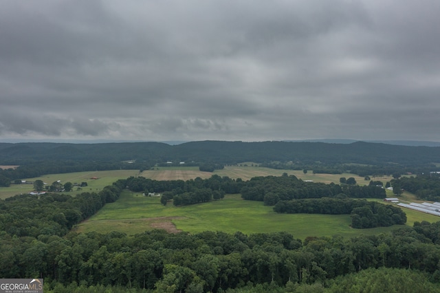 property view of mountains featuring a rural view