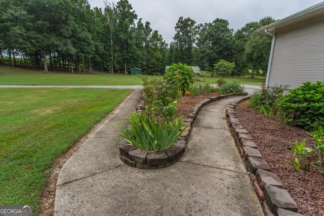 view of community with a yard