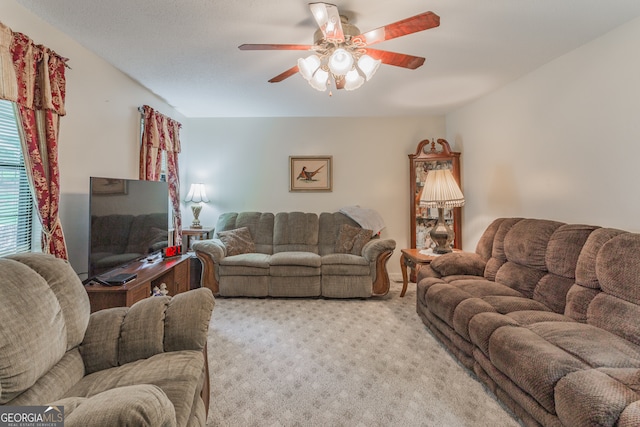 living room with light carpet and ceiling fan