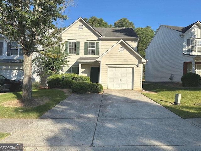 front facade featuring a garage and a front yard