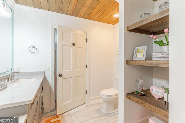 bathroom with ornamental molding, vanity, toilet, and wood ceiling