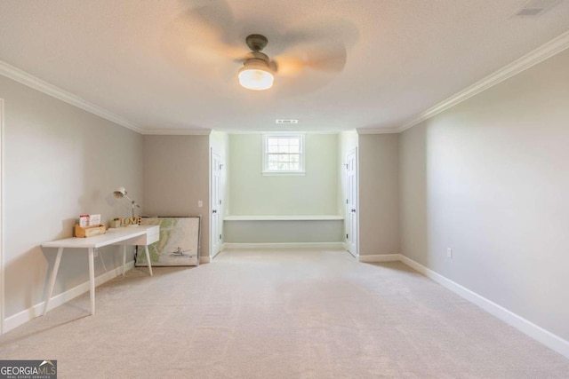 interior space with crown molding, carpet floors, and ceiling fan