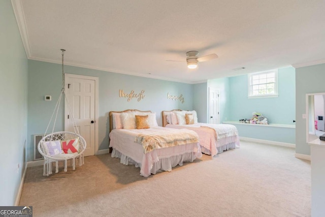 carpeted bedroom with crown molding and ceiling fan