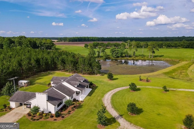 aerial view with a rural view and a water view