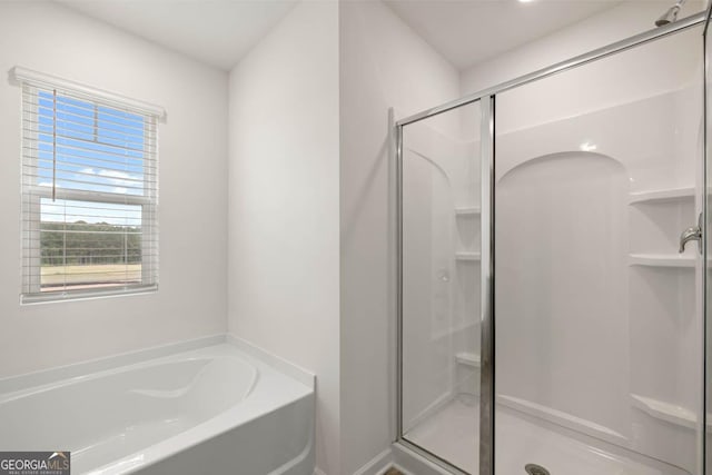 bathroom with plus walk in shower