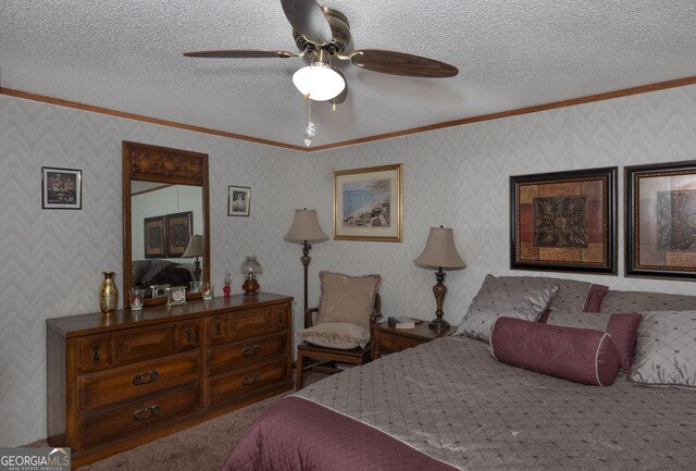 bedroom with crown molding, ceiling fan, and a textured ceiling