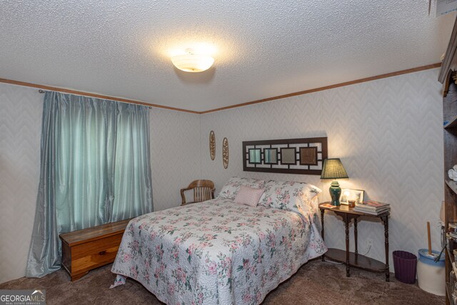 bedroom with crown molding, a textured ceiling, and dark colored carpet