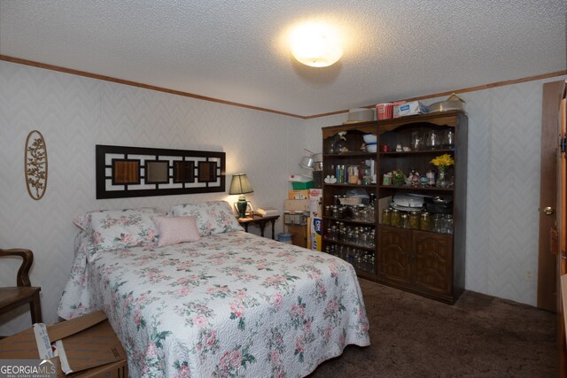 carpeted bedroom with ornamental molding and a textured ceiling